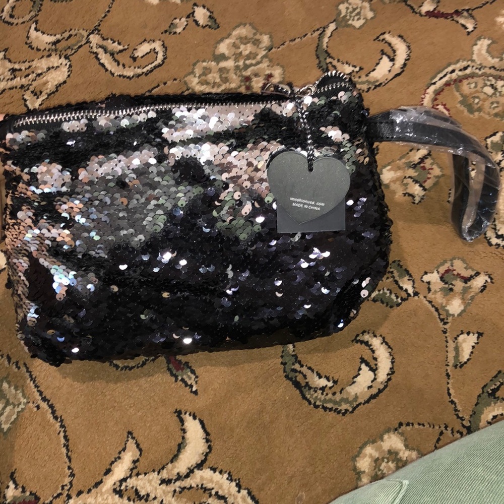 Cute black sparkly makeup bag !!